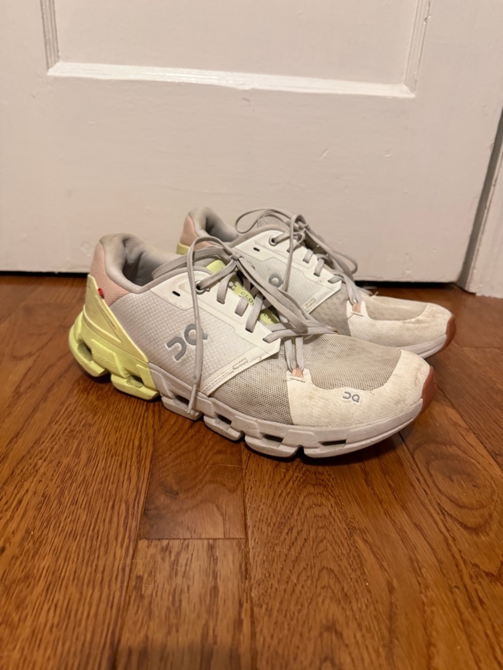 On Running Athletic Sneakers in White with Yellow and Pink Accents
